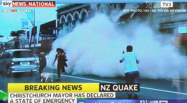 This TV frame from NZ TV3 via Sky News shows part of a building collapsing after a 6.3 earthquake hit the city of Christchurch on February 22, 2011. Multiple deaths were reported as the 6.3 magnitude earthquake struck Christchurch, toppling buildings, igniting fires and sending panicked people rushing into the streets. AFP PHOTO / NZ TV3 VIA SKYNEWS