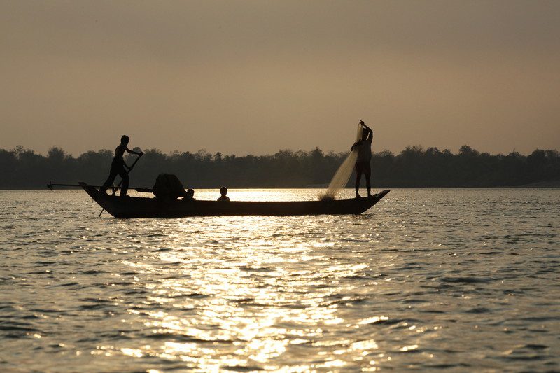 Fisherman on the Mekong river.