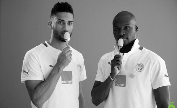 Footballers Armand Traore and Moussa Sow. Photo: Oxfam