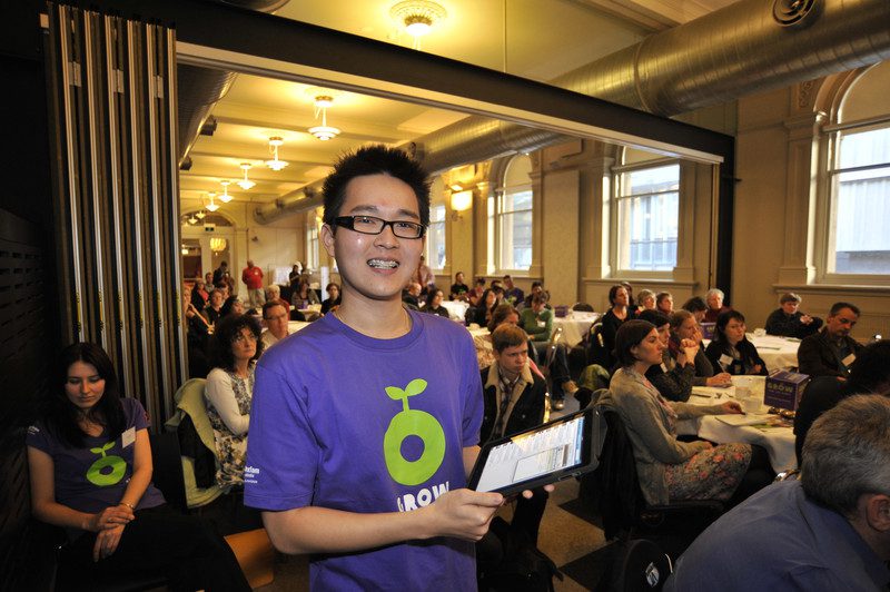 Volunteer Joshua Teng monitors Twitter at the Melbourne launch of Oxfam's GROW campaign. Photo: Lara McKinley/OxfamAUS
