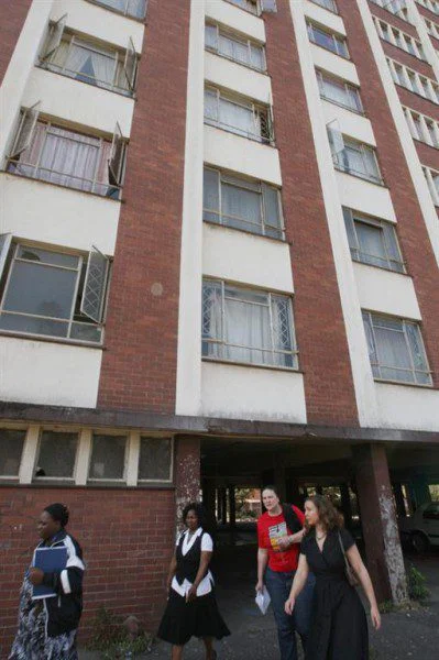 23224scr (Medium) The apartment block from which Teresa runs her creche. Photo: Matthew Willman/OxfamAUS