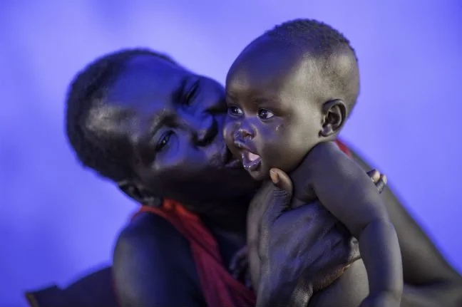 Elizabeth and baby Swampy. Photo: Kieran Doherty/Oxfam Elizabeth and baby Swampy. Photo: Kieran Doherty/Oxfam