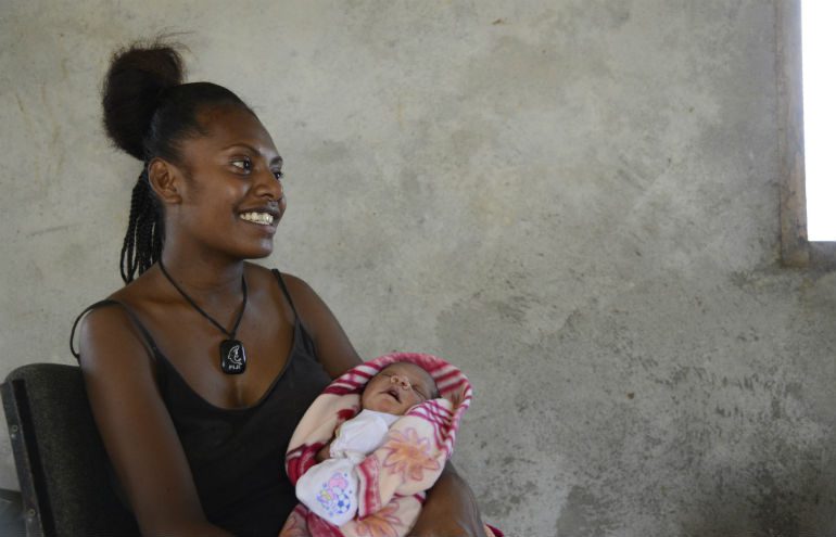 Lisa and her baby. Photo: Amy Christian/OxfamAUS