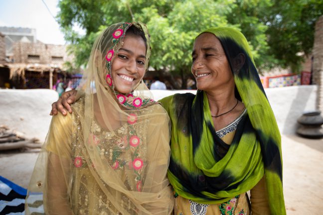 Photo: Pakistan – Samreen Babukha, 17, pictured with her mother. Credit: Khaula Jamil/OxfamAUS