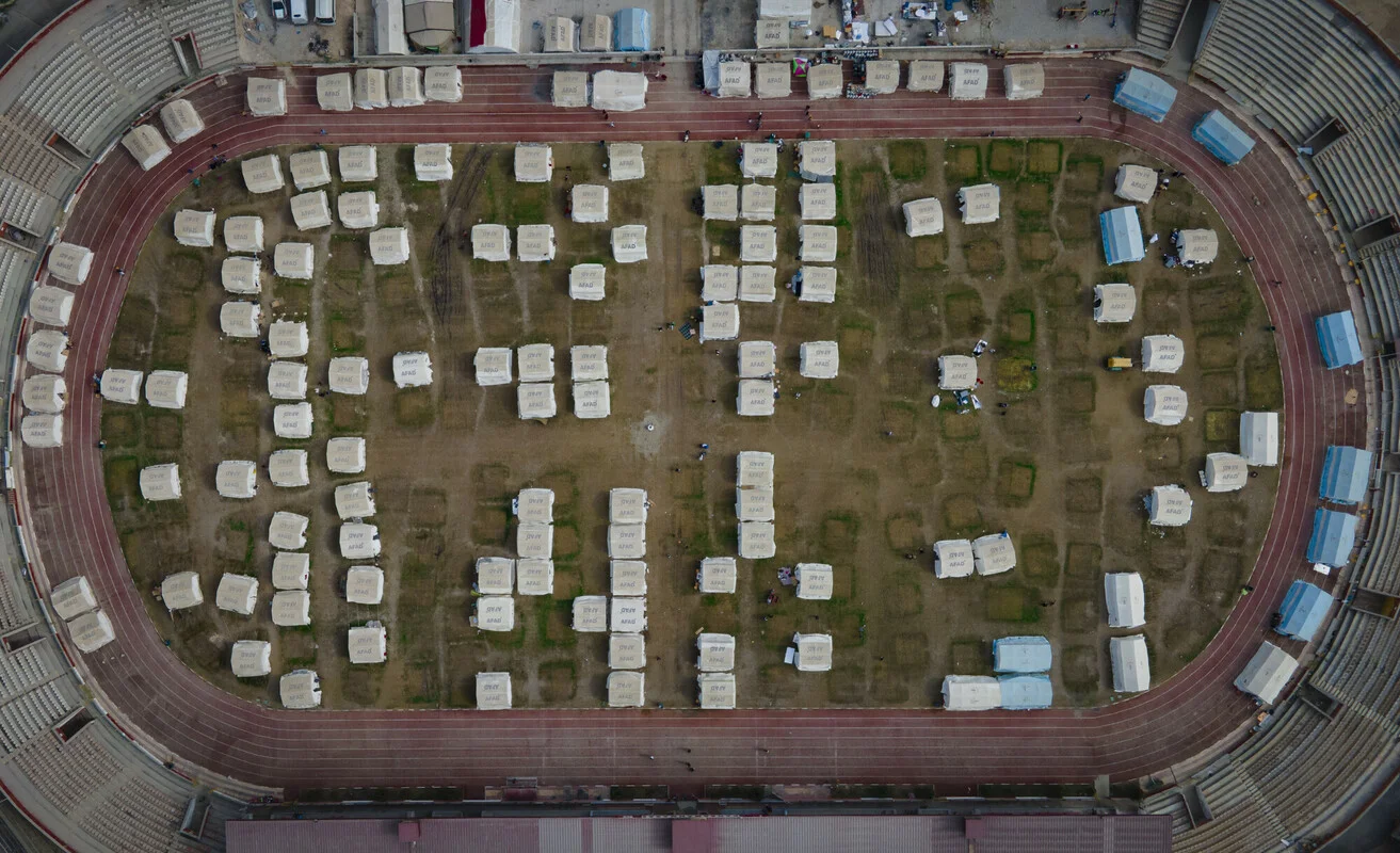 Turkiye: Tent cities have been set up in stadium to house those whose homes were destroyed and severely damaged after the earthquake. Photo: Yalcin Ciftci/Oxfam KEDV