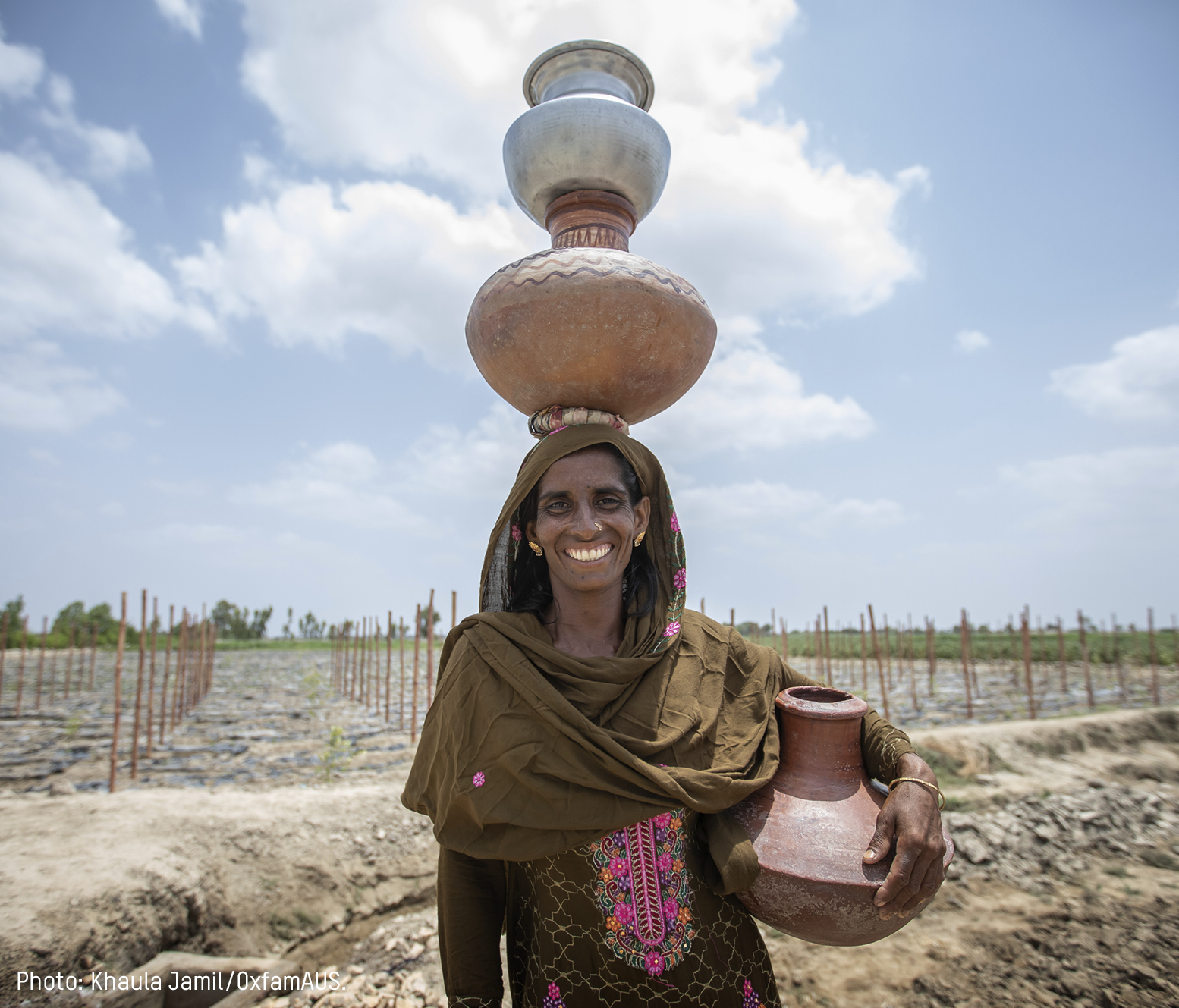 Pakistan, Asia: Mehrunnisa, 42, is a beneficiary of a High Efficiency Irrigation System and General Secretary of her Community Organisation. Through Oxfam's training Mehrunnisa has learnt to save every drop of water and grow her own vegetables. She often walks for an hour to collect water. Khaula Jamil/OxfamAUS Pakistan, Asia: Mehrunnisa, 42, is a beneficiary of a High Efficiency Irrigation System and General Secretary of her Community Organisation. Through Oxfam's training Mehrunnisa has learnt to save every drop of water and grow her own vegetables. She often walks for an hour to collect water. Khaula Jamil/OxfamAUS