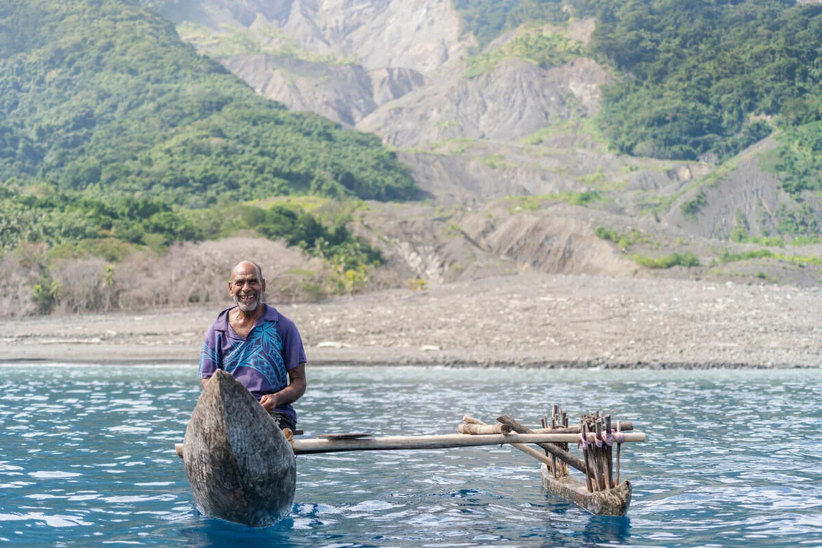 Vanuatu: Roy fishes off the coast of his home, Molpoe village in Vanuatu. In 2022, Molpoe was hit by a devastating landslide caused by torrential rain, which has become more frequent due to extreme weather. The landslide destroyed many homes and plantations that the people relied on for their livelihoods. Photo: Ivan Utahenua/Oxfam Vanuatu: Roy fishes off the coast of his home, Molpoe village in Vanuatu. In 2022, Molpoe was hit by a devastating landslide caused by torrential rain, which has become more frequent due to extreme weather. The landslide destroyed many homes and plantations that the people relied on for their livelihoods. Photo: Ivan Utahenua/Oxfam